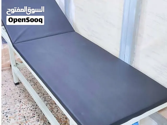 سرير كشف شبه جديد