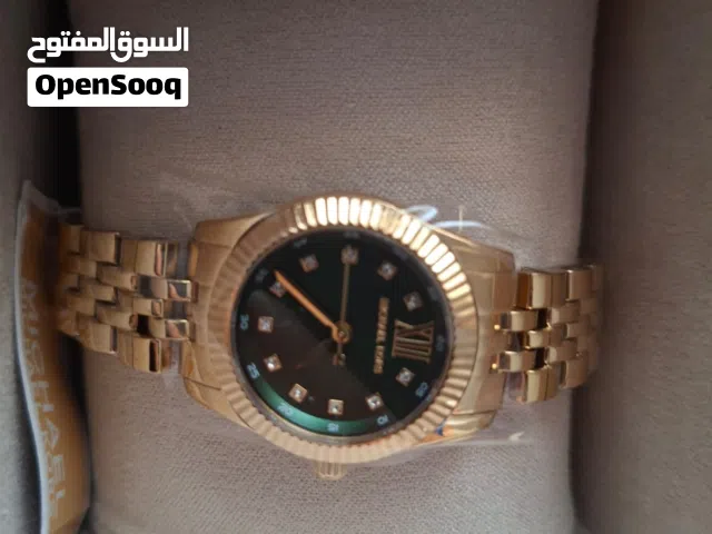 Montre  dorée femmes