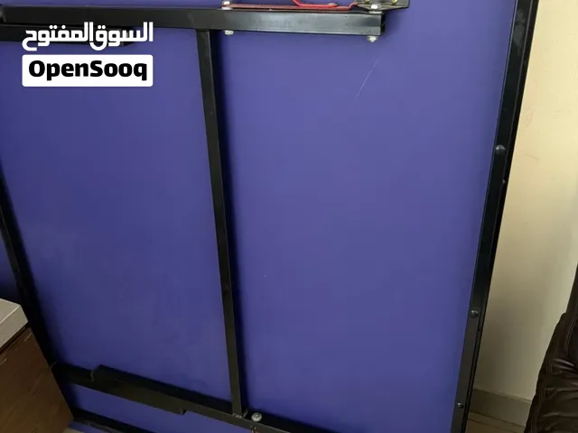 Table tennis table and Sit-Up Abdominal Bench