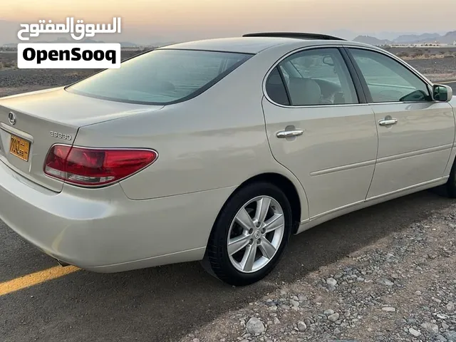 لكزس ES 300 موديل 2006 لون بيج، مرخصة، فحوصات أمريكية، سيارة سيدان فاخرة مستعملة