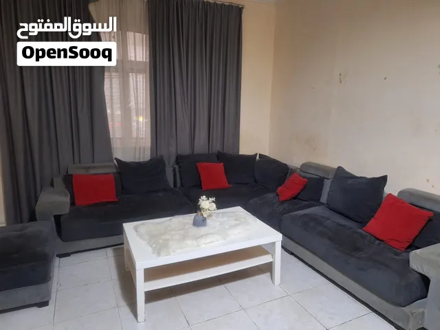 كنب مستعمل رمادي بمخدات حمراء للبيع المستعجل Used gray sofa with red cushions for urgent sale