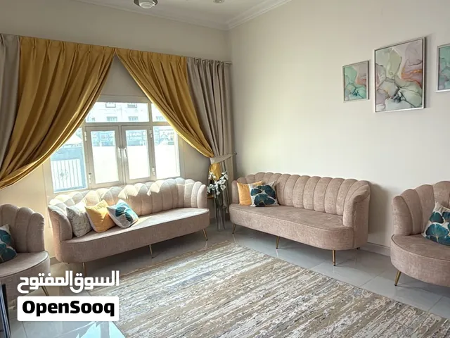 Sofa with curtains  with wall papers  for sale 200 rial only