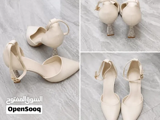 Elegant Cream Pointed-Toe Heels - Size 40 - crystals Block Heel