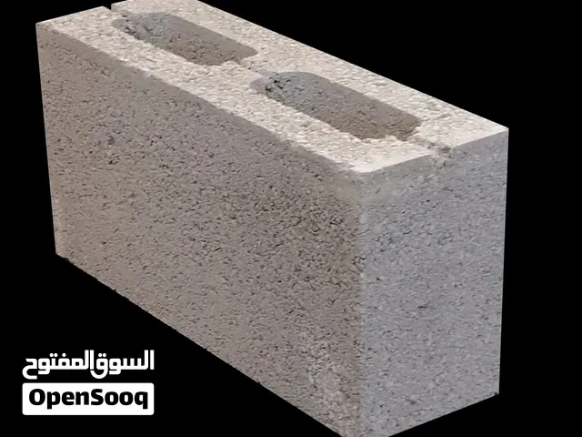رمل أسود وأبيض وأحمر، طابوق، كنکری، إسمنت، جبس وباسكو فی العین ابوظبی