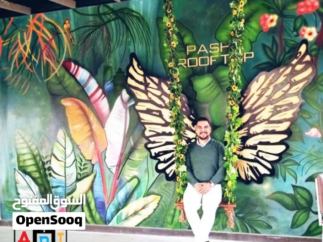 رسام وخطاط ونحات محترف