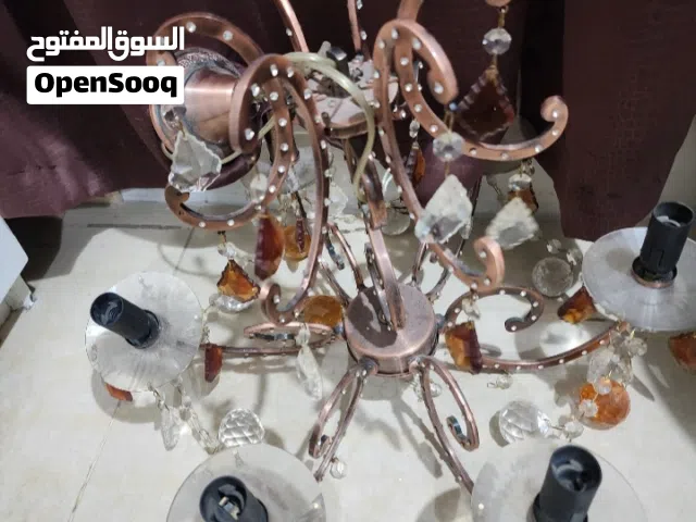 ثريتين كريستال اصلي لون عسلي والحديد بني معتق شغالين كرستال العصفور اصلي