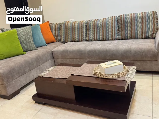 كنب كورنر قماش وتر بروف مع طاولة وسط خشب زان تقيل