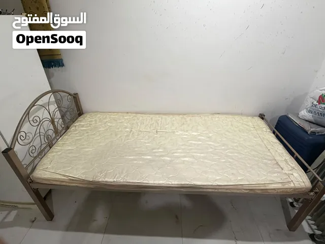 Single steel bed and mattress