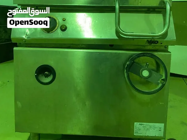 مطلوب غطاء صاح طباخ لهذا الجهاز المربع حق الطبخ