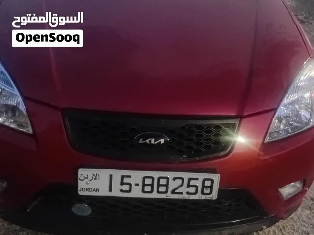 سيارة كيا ريو 2011 كوبيه جديدة ومرخصة بمواصفات كوريا، أحمر، أوتوماتيك، 5 مقاعد