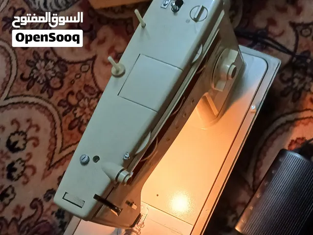 مكنة خياطة سينجر singer 518