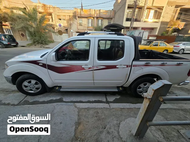 بيك أب نيسان نافارا دبل قمارة موديل 2013 بغداد LE