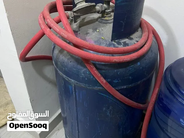 أسطوانة غاز و موقد غاز سهل النقل