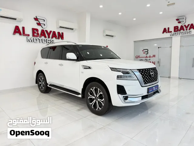 نيسان باترول تيتانيوم V8 ابيض/ زعفراني 2023 (خليجي)