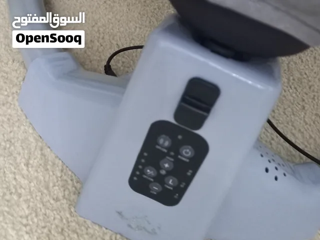قعماز أو قعاد أطفال هزاز مستعمل شبة جديد يشتغل بالكهرباء..