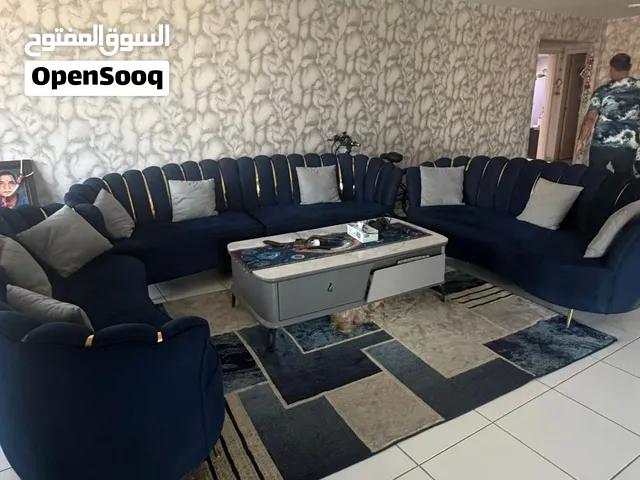 Dark blue comfortable sofa for 12 ppl