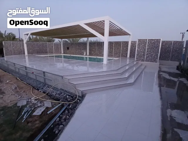 ابو ادم للمقاولات مزارع الوفرة تنثيق حدائق حداده عامه تسوير مزارع عمل بحيرات ونوفير