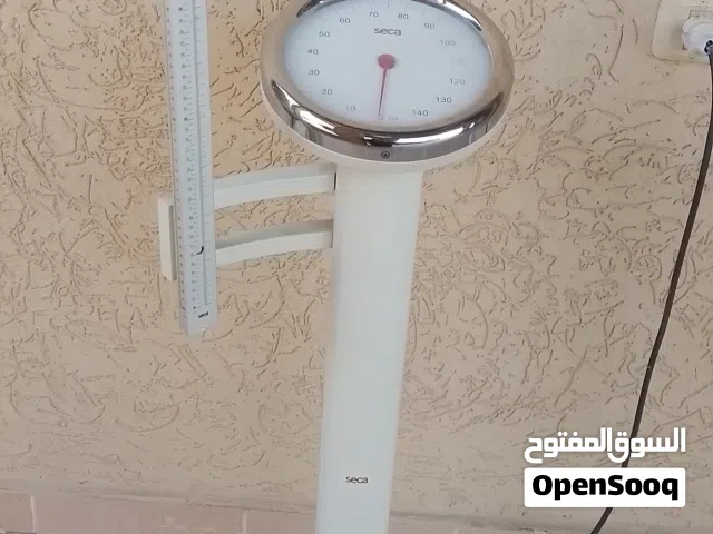ميزان لقياس الوزن والطول