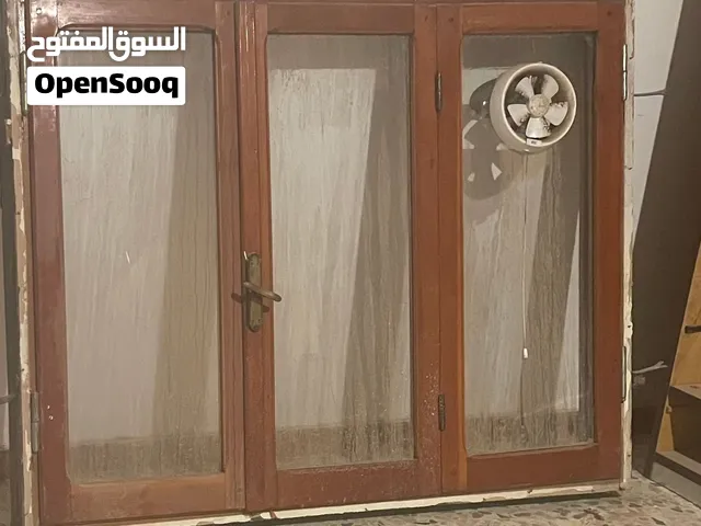 رواشن وابواب بالكونة خشب