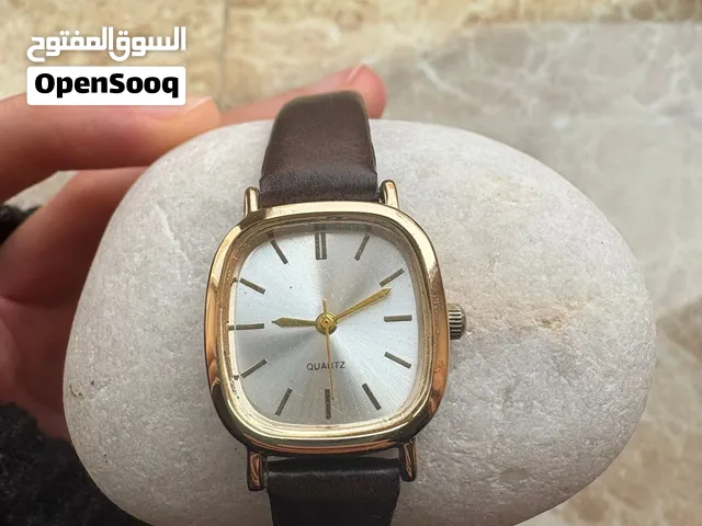 Women’s Brown leather watch with gold detail