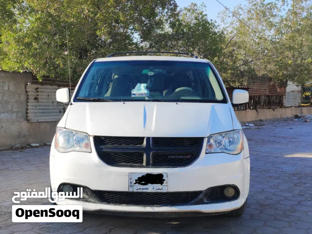 .سيارة دوج كرفان موديل 2013 جاهزة رقم البصرة خصوصي بأسمي سنوية 27 حادثة فقط جاملغ امامي ايمن