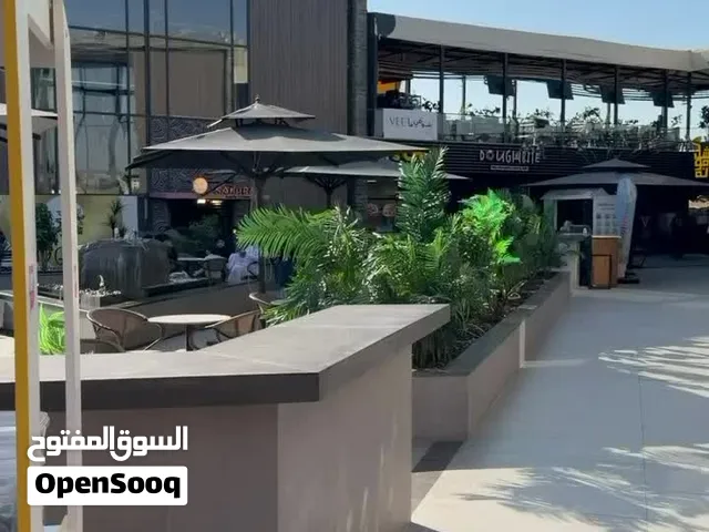 حلويات موجود عرباية كاندي  ضمان شهري او بيع  في مجمع على طريق المطار