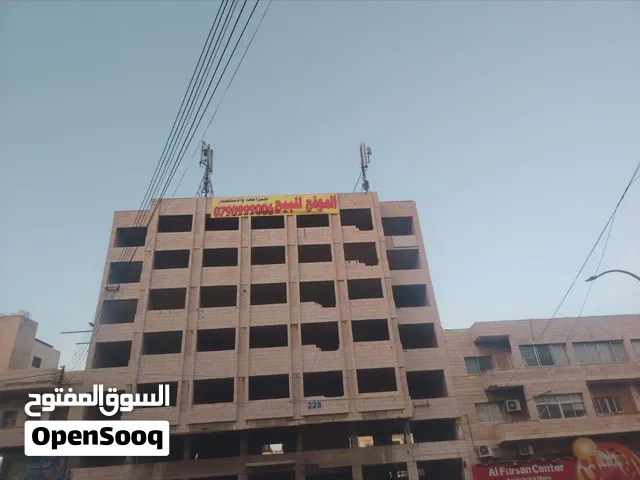 مجمع تجاري في العبدلي مقابل المستشفى الاسلامي