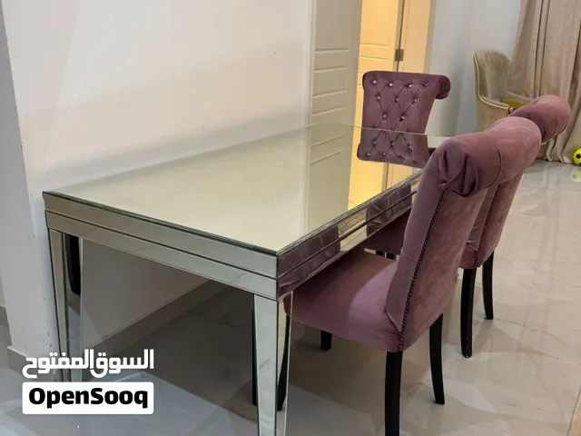 طاولة طعام زجاج مع 4 كراسي