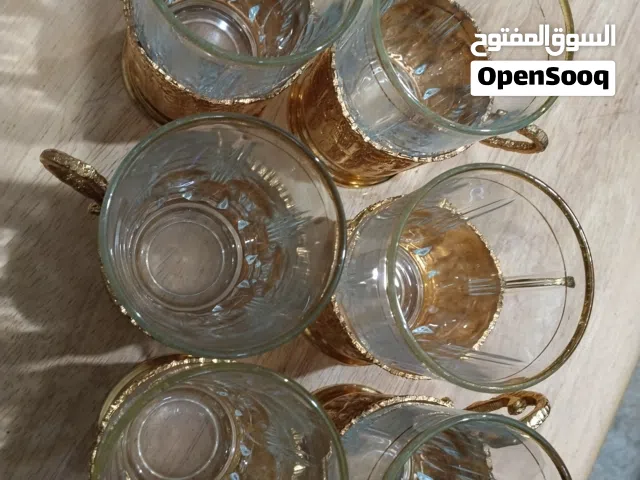 اکواب زجاجیه للشاي مع مسکه لون ذهبي