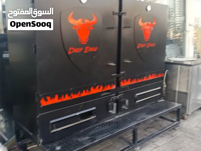 Wood-fired smoker oven for meat فرن لحوم مدخن على الحطب