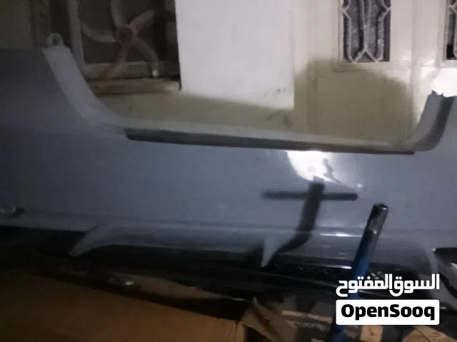 طمبونات امامي خلفي مستعملات +أكس امامي يمين (تيوتا كامري) لون:اسمنتي