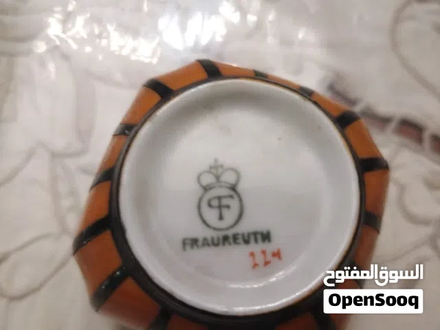 طقم فنجان المانى ملكى من الفضه والبورسلين نادرتحفه يتغير لونه بتغير الاضاءه فون