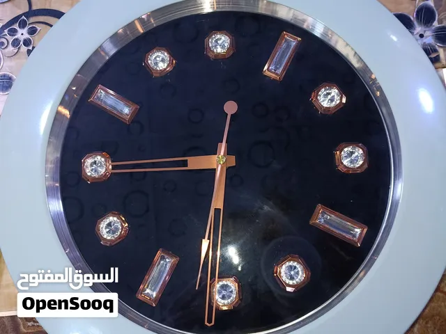 ساعات جداريه على 5 الاف