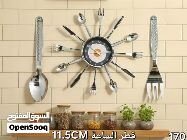 ساعة حائط شكل ادوات المائدة