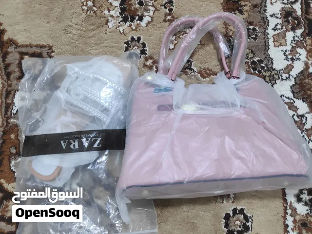 حقائب و أحذية نسائية