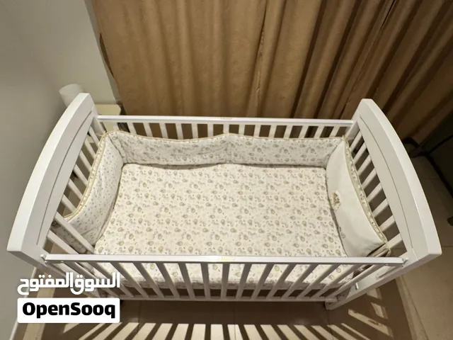 Baby cot with mattress