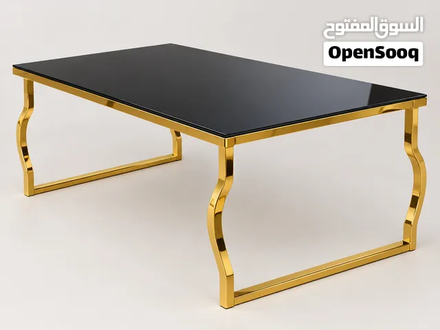 طاولة زجاج وسط بحالة جيدة و لوحة حائط بحالة ممتازة