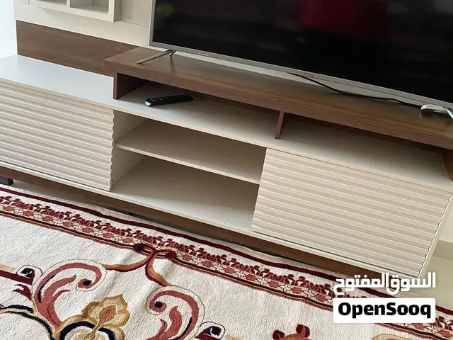 طاوله حق تلفزيون متعاني من شي