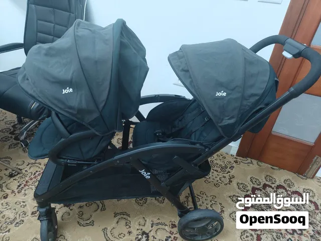 عربة اطفال التوائم joie الغنية عن التعريف بحالة ممتازة جدا