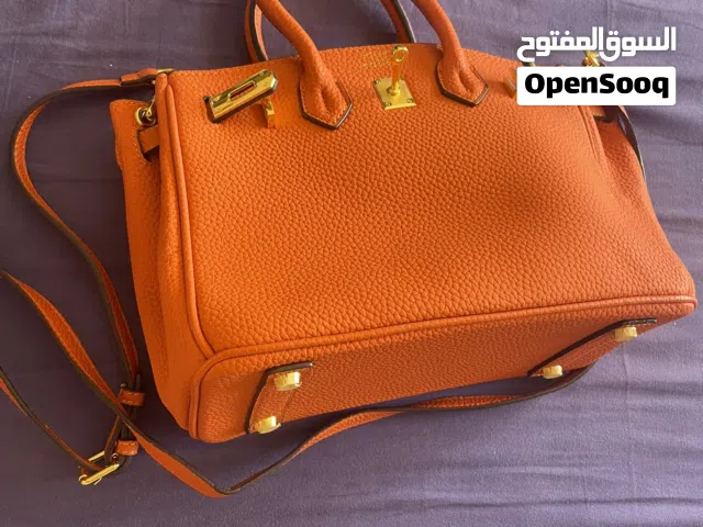 شنطة يد محفظة