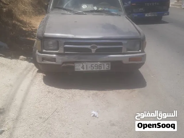 تويوتا هيلوكس 1997 بيك اب مستعمل بحالة ممتازة مع أنوار نهارية ومواصفات كوريا