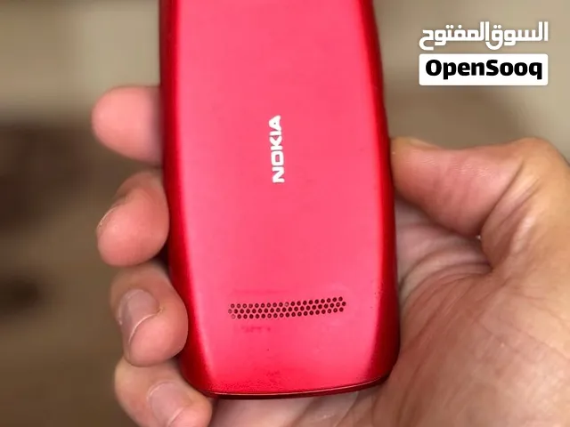 نوكيا هاتف مستعمل أحمر بذاكرة غير محددة لعمر أكثر من 3 سنوات Nokia Asha 306  ف ضربه بالشاشه دي بصور