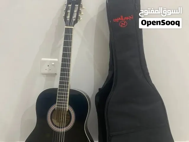 جيتار باللون الأسود كلاسيكي لامع مع الحقيبه
