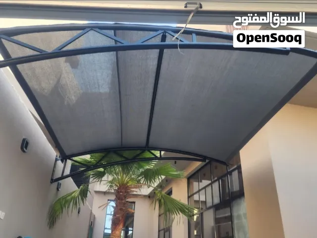 مظلات سيارات مظلات مدارس بايكات سيارات سواتر برجولات ساندويتش بانل سواتر مجدول مظلات احواش