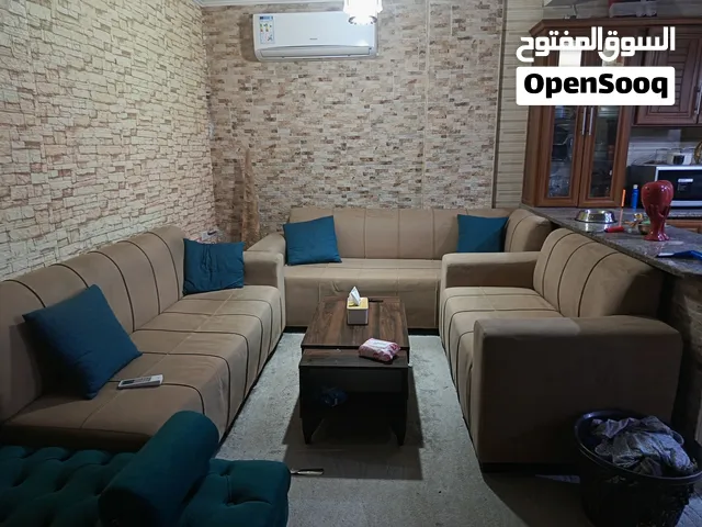 غرفة جلوس مع بفه