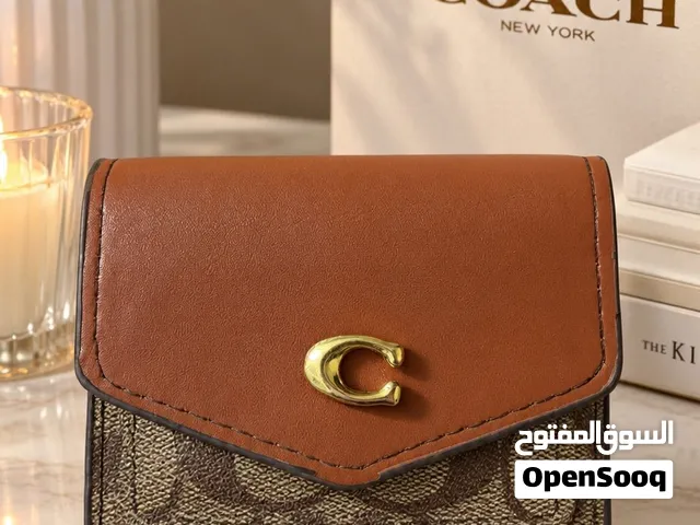 محفظة coach