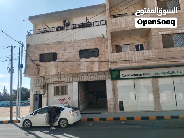 عمارة ثلاث طوابق مع مخزنيين تجاري على شارع جرش ملاصق لبنك القاهرة عمان