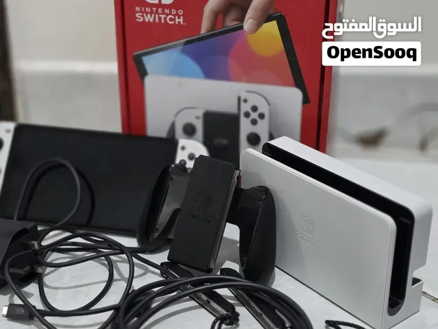 للبيع جهاز نينتندو سويتش أُوليد (Nintendo Switch OLED) باللون الأبيض الشهير
