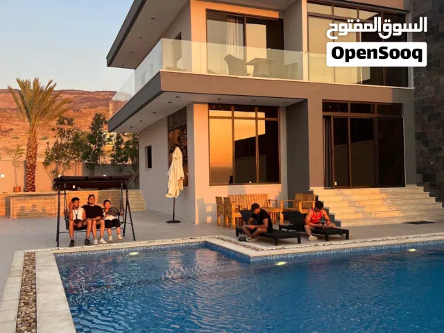شالية ومزرعه في البحر الميت مطل على البحر الميت مقابل فندق الهلتون وسماره مول