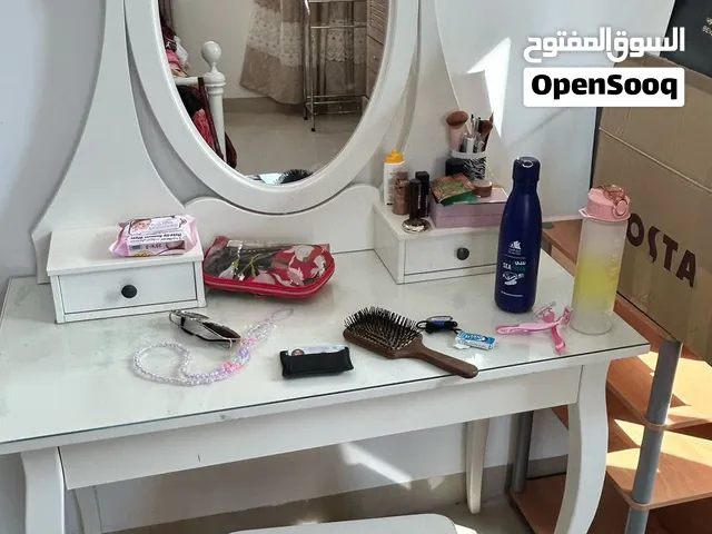 A white Ikea Dressing table with the stool